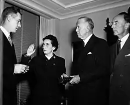 Anna M. Rosenberg being sworn in as Assistant Secretary of Defense by Felix Larkin (left), General Counsel of the Department of Defense. General George Marshall (second from right) and Robert A. Lovett (right), Deputy Secretary of Defense, witness. November 15, 1950.