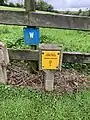 Marker posts for the Aquarius line water main near Ballynahinch.