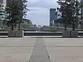 The Arc de Triomphe from La Défense 5 km (3 mi) away, showing how precisely the axis is aligned.