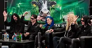 Arch Enemy in 2016(from left to right: Sharlee D'Angelo, Michael Amott, Alissa White-Gluz, Jeff Loomis, and Daniel Erlandsson).