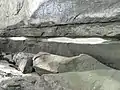 The rocks between the point and St Heliers Bay. White siltstone layer.