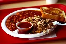 Image 42BBQ sandwich and baked beans (from Culture of Arkansas)