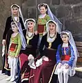 Armenians women wearing a Arkhalig.