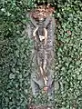 A glazed terracotta plaque approximately 40 metres (130 ft) west of the fountain