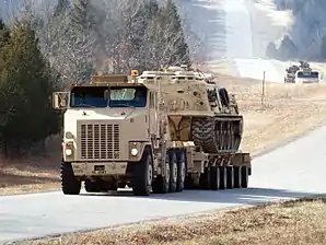 Oshkosh M1070A0 tractor, M1000 semi-trailer and M88 ARV payload