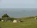 Remains of German defences and the Mulberries in the background