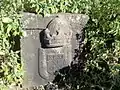 Portuguese post of arms engraved in rock on the Fort