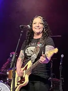 Country singer Ashley McBryde is performing onstage in 2020.