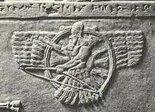 The "feather-robed archer" figure in the 1968 flag is inspired by Assyrian Empire period iconography.