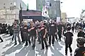 Muslims strike their chests as they march to mark the Day of Ashura.