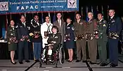 Nine servicemembers representing the four active duty services, reserve components and the Coast Guard were presented the Federal Asian Pacific American Council's Military Meritorious Service Award during the Defense Department's Asian Pacific American Heritage Month luncheon and military awards ceremony in Arlington, Va., 2 June.