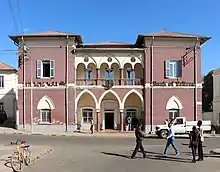 Ornate, two-story red-brick building