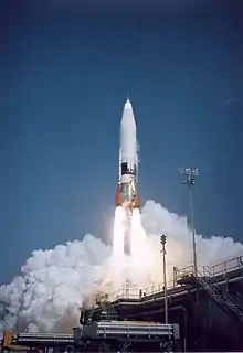 A rocket takes off from the launch pad.