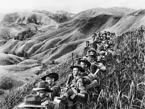 Image 17Australian soldiers resting in the Finisterre Ranges of New Guinea while en route to the front line (from New Guinea)