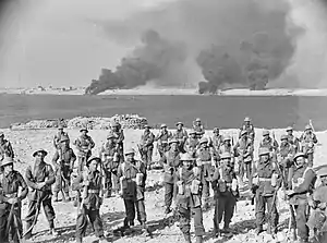 Members of 'C' Company, 2/11th Battalion, having penetrated the Italian outer defences at Tobruk, January 1941