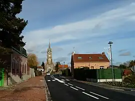 The church and surroundings in Awoingt