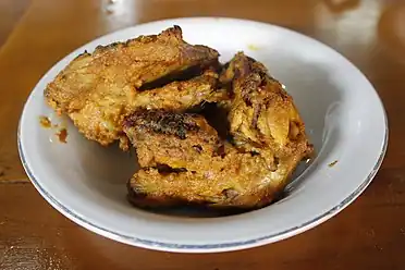 Ayam bakar Padang, Indonesian grilled chicken in rich bumbu (spice mixture); shallot, garlic, chili pepper, candlenut, galangal and turmeric.