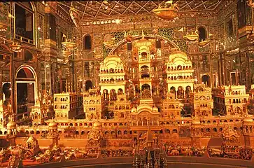 A gold carving depiction of the legendary Ayodhya at the Ajmer Jain temple.