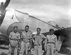 Members of Mexico's 201st Air Fighter Squadron and a P-47 Thunderbolt during the Philippines Campaign in 1945.