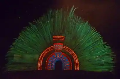 Dyed feather headdress from the Aztec people of Mexico and Central America. For red they used cochineal, a brilliant scarlet dye made from insects.