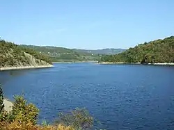 Lake Vrutci, in close proximity to village