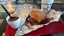 Image 5Pulled pork sandwich and baked beans (Cabot) (from Culture of Arkansas)