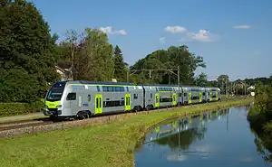 Silver train with green trim