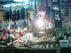 Brightly lit shop outside Bi Bi Pak Daman