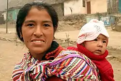 Image 29Amerindian woman with child (from Demographics of Peru)