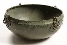 Colour photograph of a hanging bowl