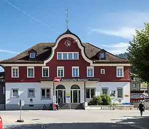 Two-story building with hip roof