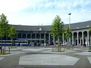 Semicircular facade composed of two-story arches