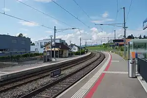 Double-track railway line with side platforms