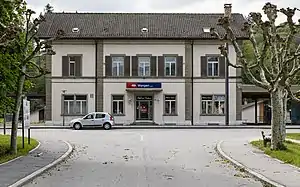 Two-story building with gabled roof