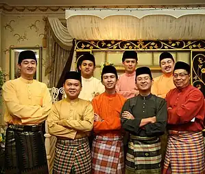 A group of Bruneian men wearing songkok as part of Baju Melayu traditional Malay attire