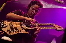 Balawan in 2012 on double neck guitar