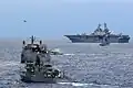 The forward-deployed amphibious assault ship USS Essex (LHD 2) leads ships formation during photo exercise (PHOTOEX) with Philippines Navy ships during Balikatan 2009 (BK09).