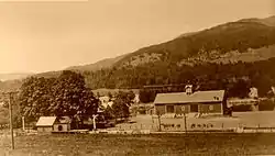 Balloch Station c.1910 with Milk House on right, Balloch Farm in background