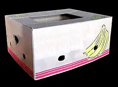 Telescope box used for bananas.  Note hand holes and ventilation holes