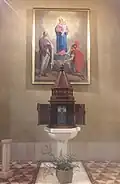 The baptismal font where bishop Maurizio Malvestiti was baptized