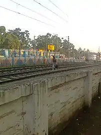 Passengers are walking on the railway tracks at Barasat