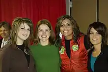 BarlowGirl with fan (from left to right: Lauren, fan, Rebecca and Alyssa).