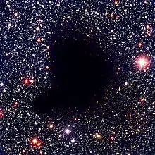 Barnard 68, at a distance of only 410 light-years, is one of the nearest Bok globules. Its diameter is about 12,500 AU (0.198 ly) (≈ 2 trillion km)