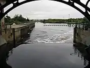 View through the north gate of Tees Barrage showing fish pass entrance (centre left) and monitoring camera (right)