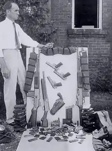 Over a dozen guns and several thousand rounds of ammunition from Bonnie Parker's shotgun, (including 100 20-round BAR magazines) were in the perforated Ford after deaths of Bonnie and Clyde.