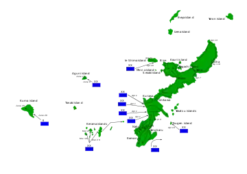 Map of a crescent-shaped island, with plans for four American divisions to land on its western shore