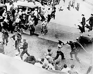 Image 31Striking teamsters armed with pipes battle police in the streets during the Minneapolis Teamsters Strike of 1934.