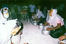 Be. Popular celebration in Holhudu Island. Men dressed like evil spirits beat empty bandiyaa water pots in the night.