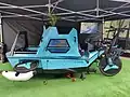 The BeTRITON (e-bike, e-boat, and camper) on display