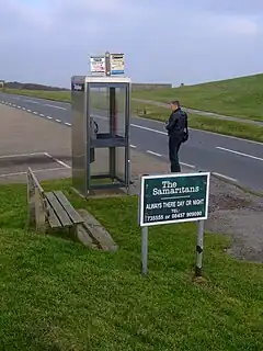 Image 39Phone box and sign advertising the Samaritans at Beachy Head. (from Beachy Head)